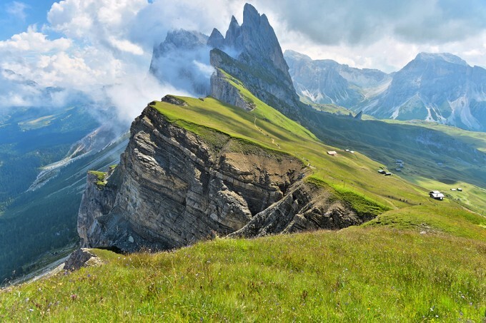 Odle mountains chain separating the Funes valley from the Gardena valley, taken from the Seceda refuge, Italian alps